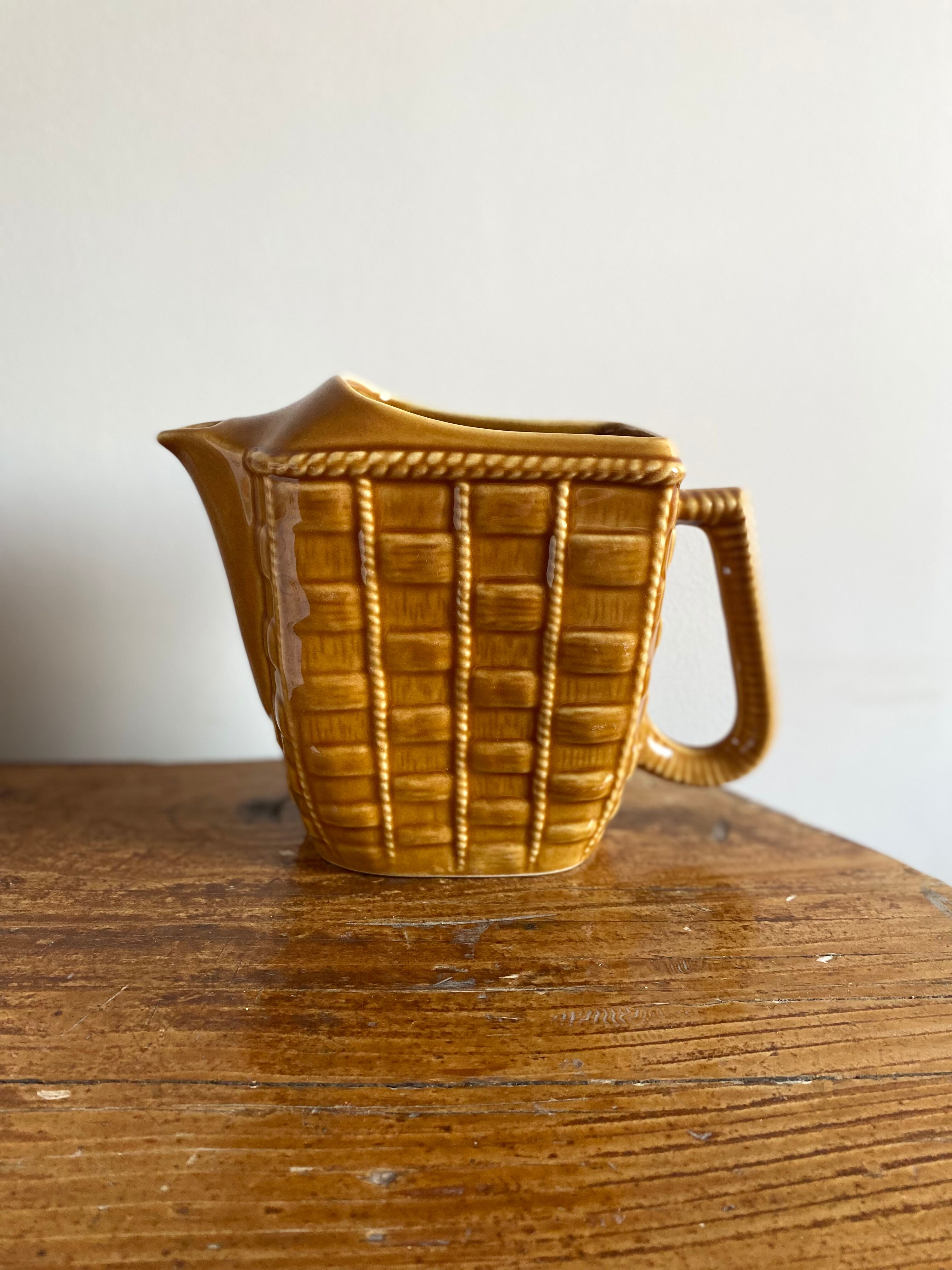 Glazed ceramic water pitcher