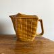 Glazed ceramic water pitcher