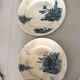 Two iron earth dishes
