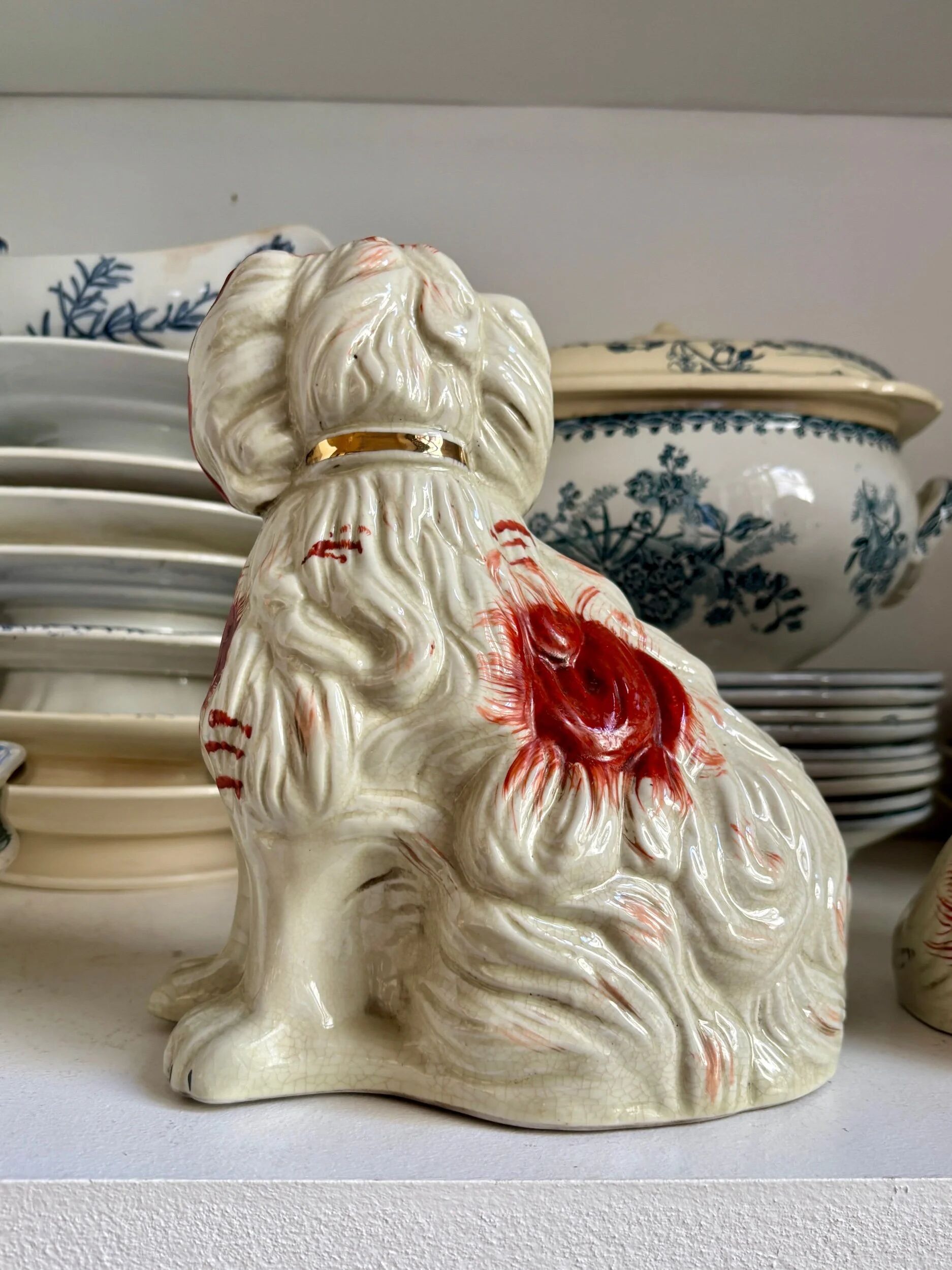 Pair of red Cavalier King Charles dogs in Staffordshire pottery, 19th century.