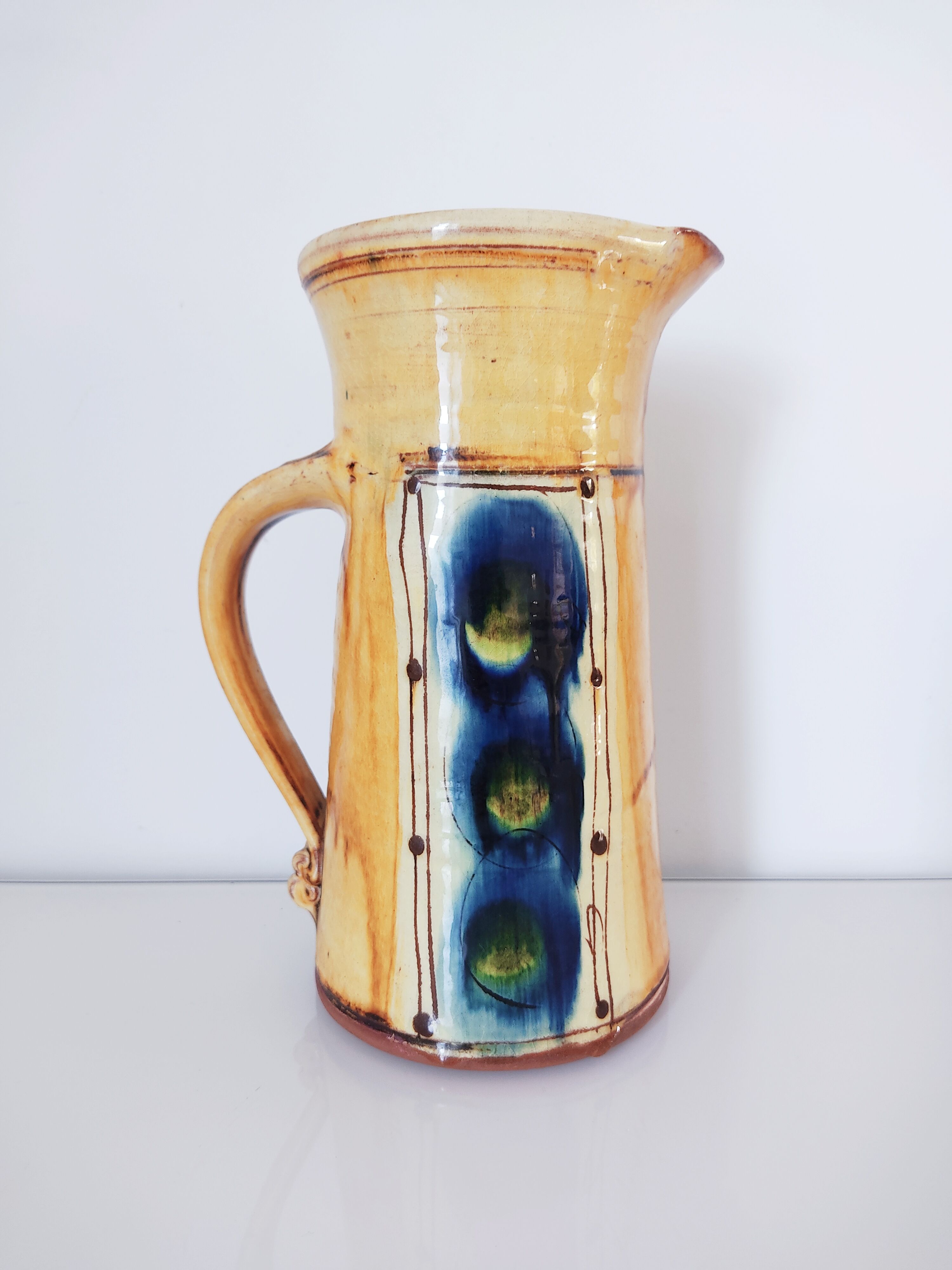 Cruche terre cuite émaux jaune et bleu