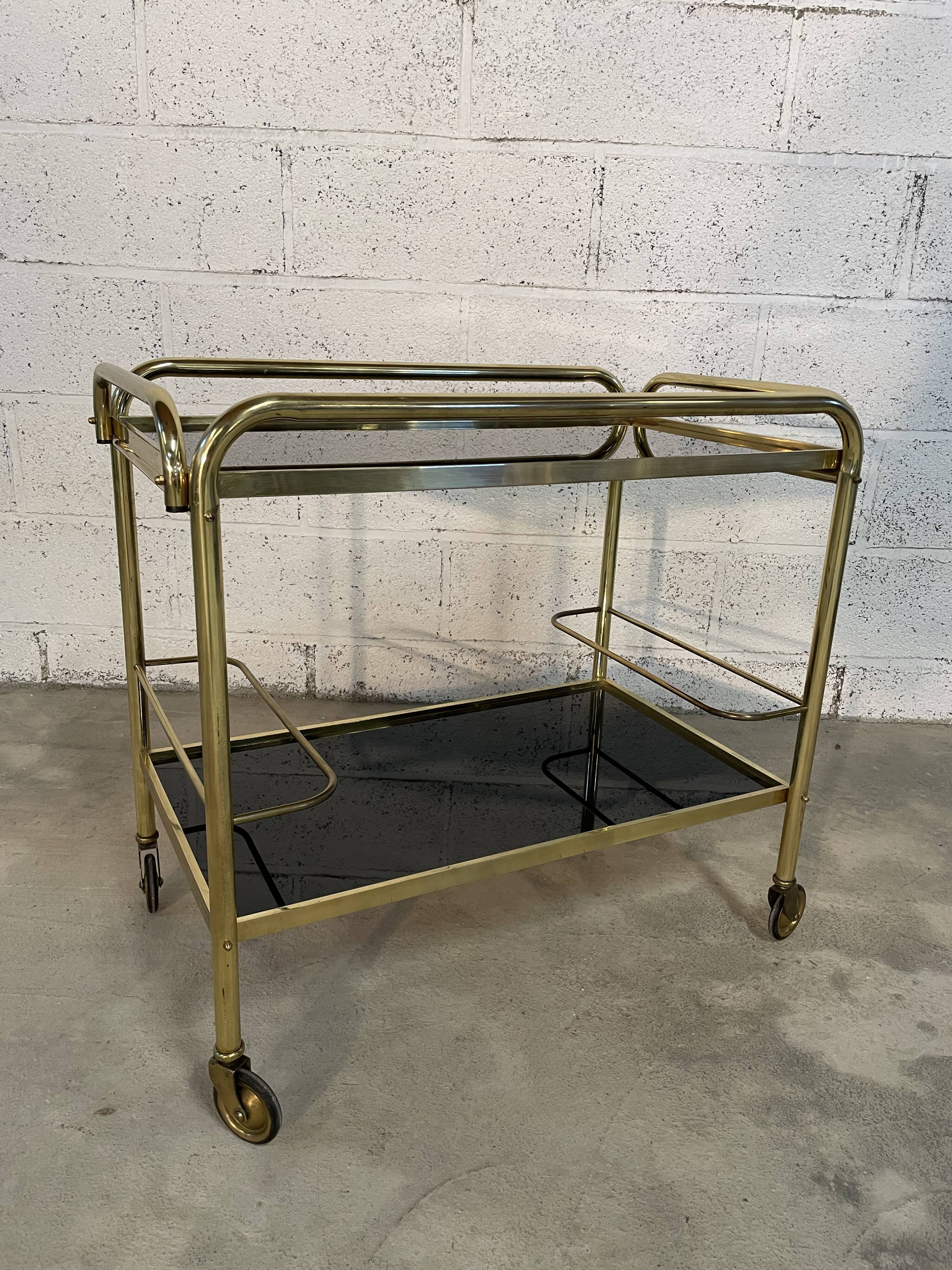 Vintage golden and black rolling service 1970s