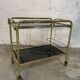 Vintage golden and black rolling service 1970s