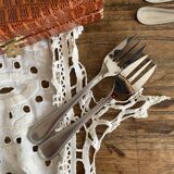 Silver dessert forks in a box