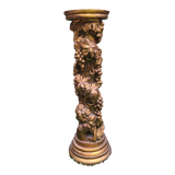 Wooden column in carved wood