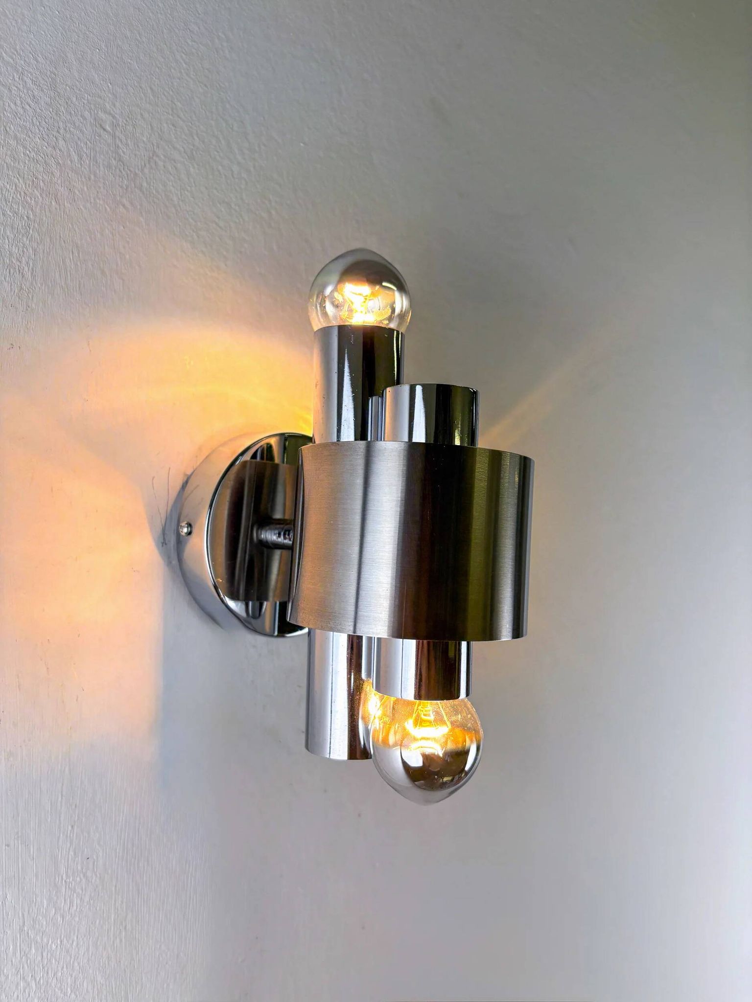 Pair of space age 2-light wall sconces, chromed metal, Italy, 1970s