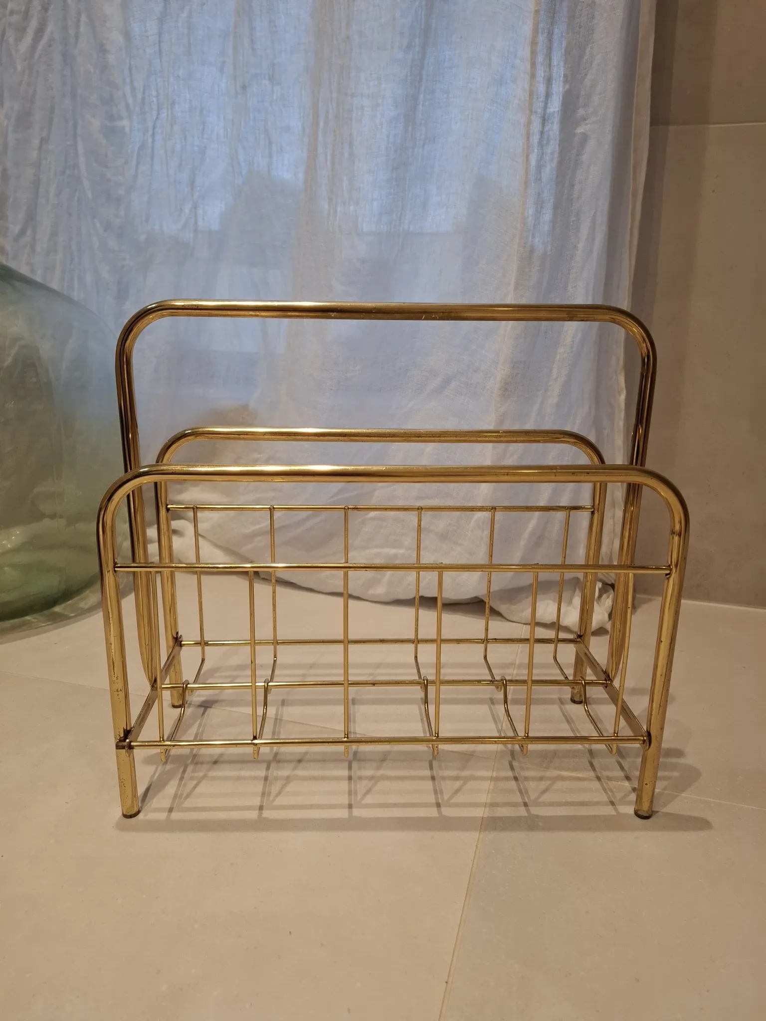 Golden metal magazine rack
