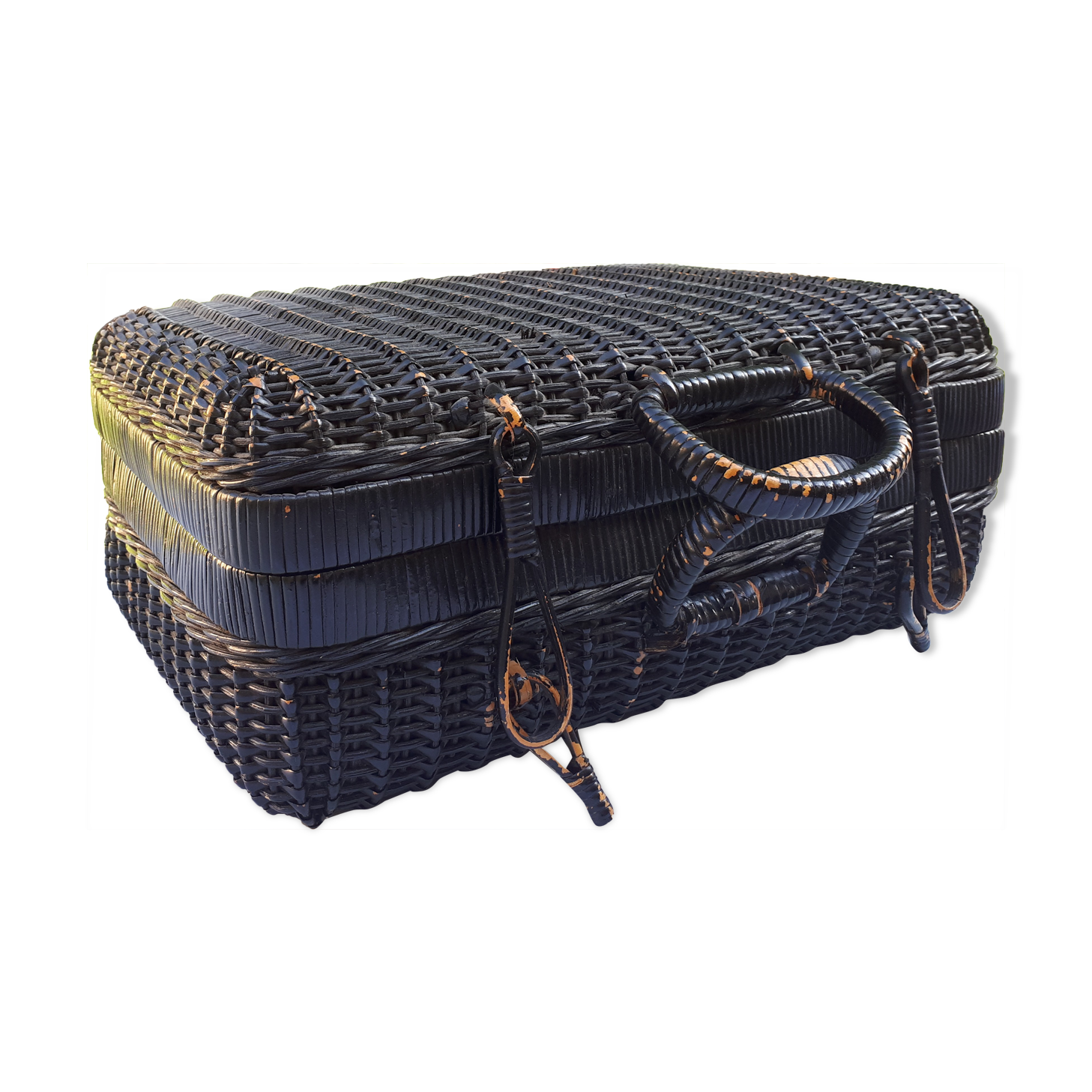 Old black wicker suitcase