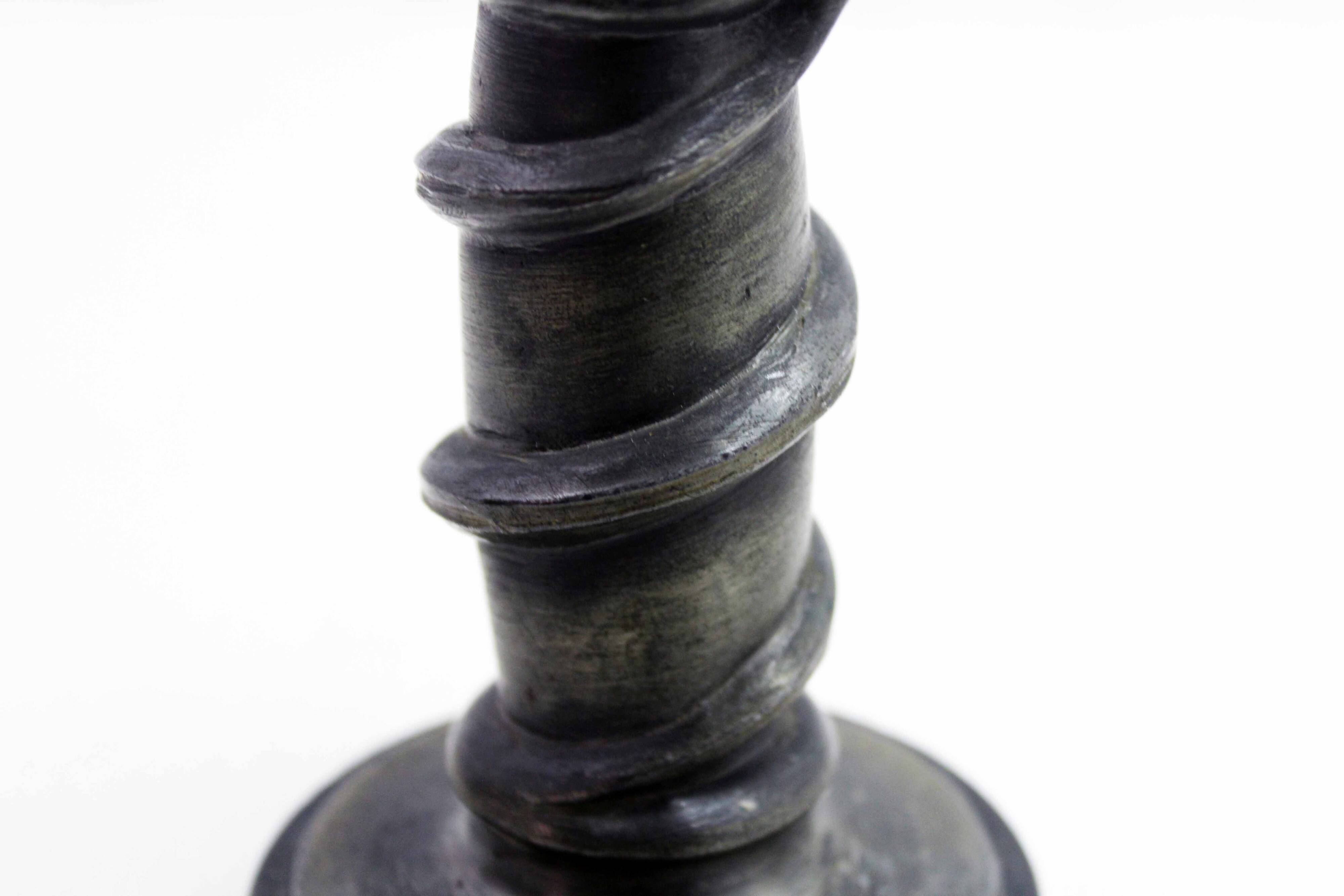 Serpent candlestick in pewter, early 20th century.