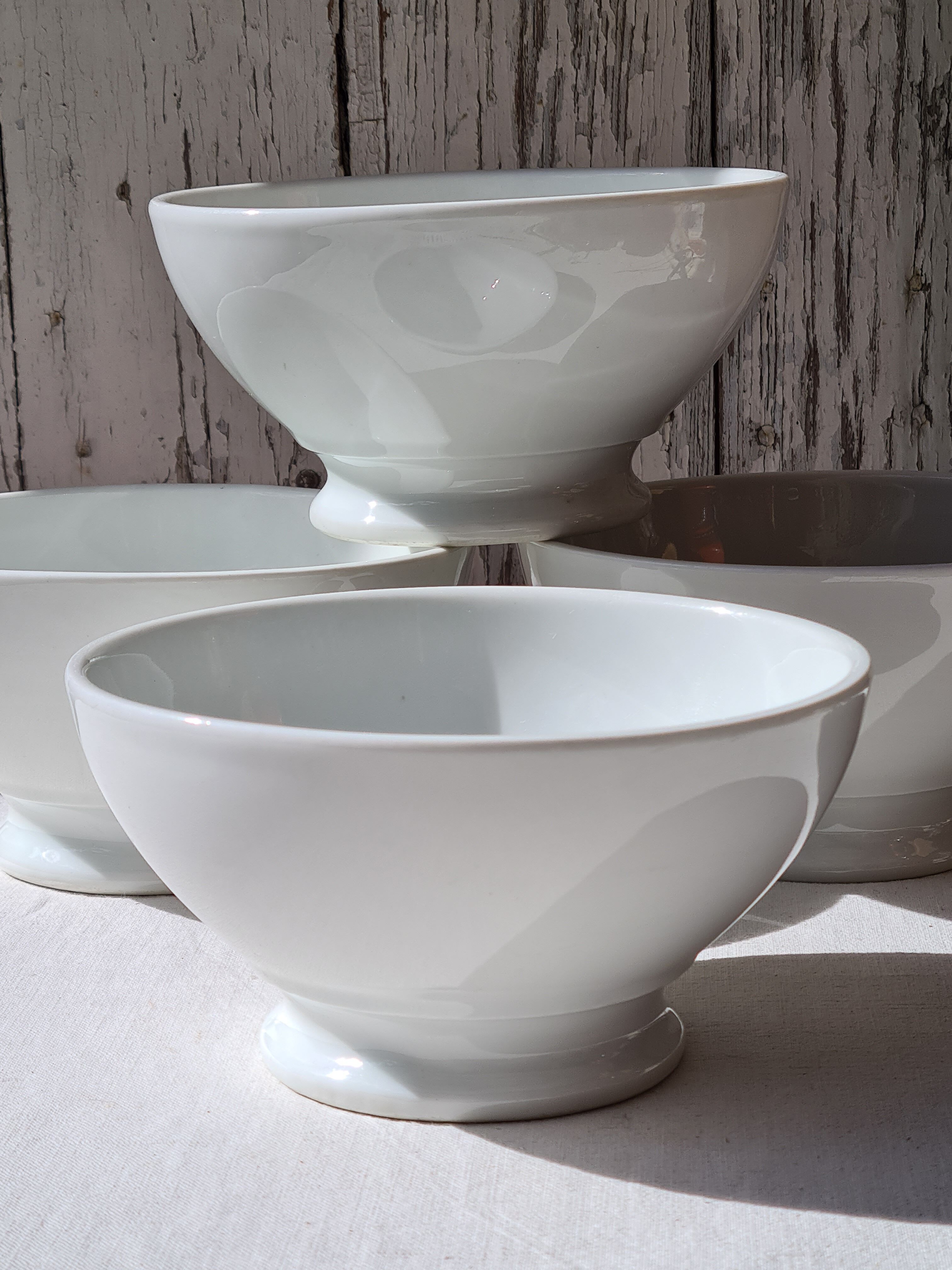 Four bowls made of thick white porcelain