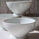 Four bowls made of thick white porcelain