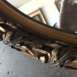 Oval golden mirror