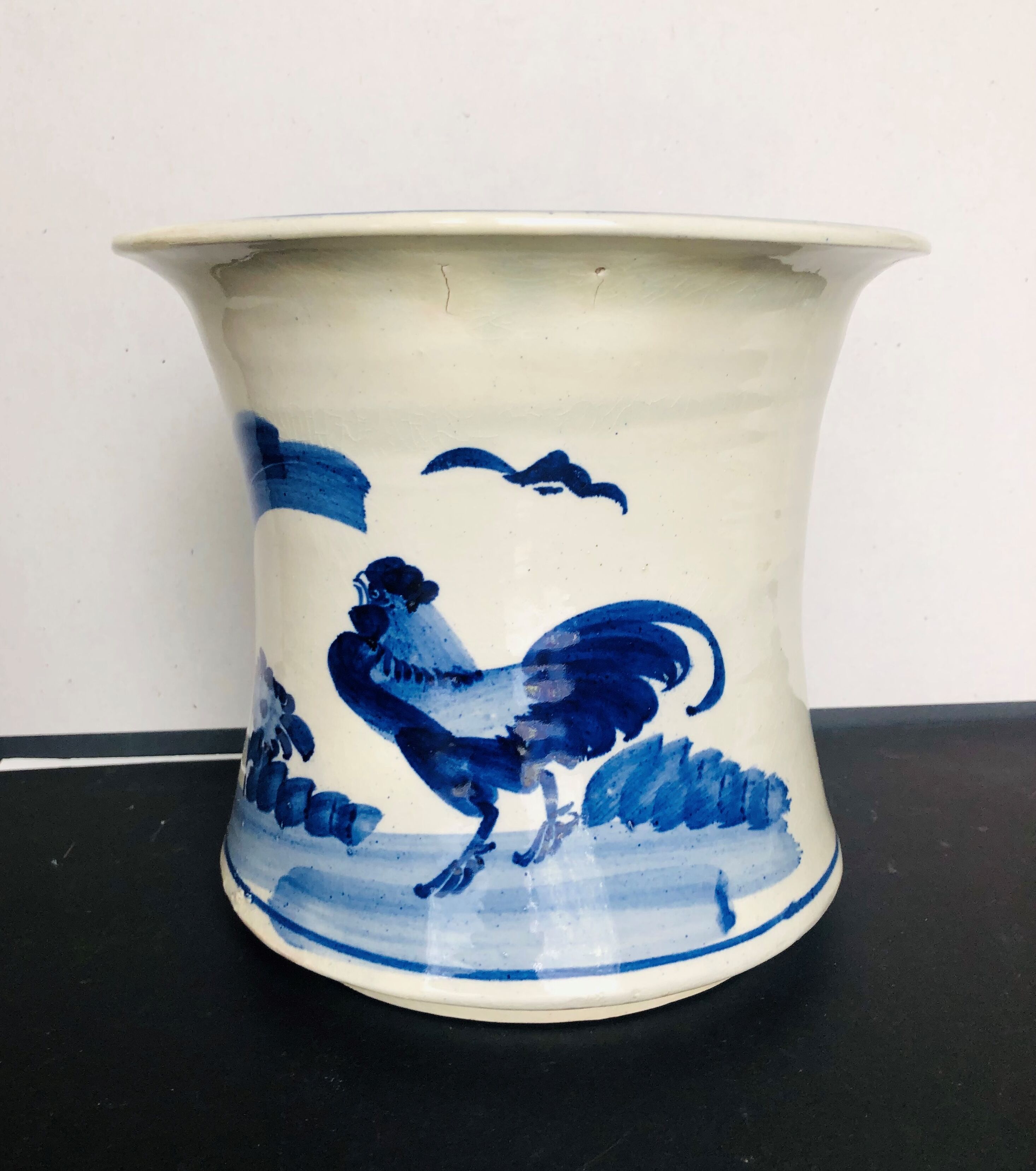 Old white blue ceramic pot cover