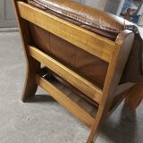 Armchairs in leather and vintage wood 70's