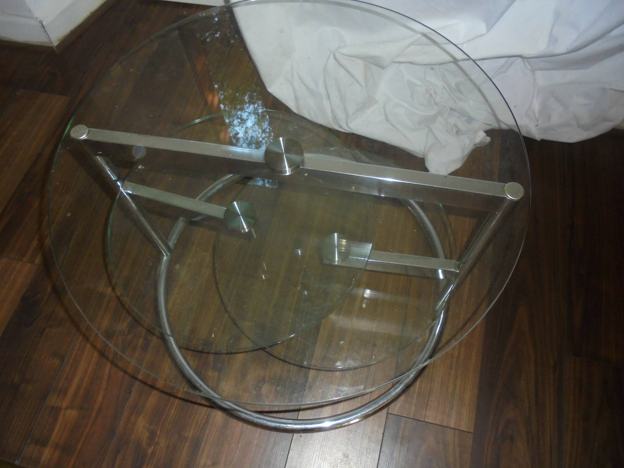 Glass coffee table with swivel tops circa 1980