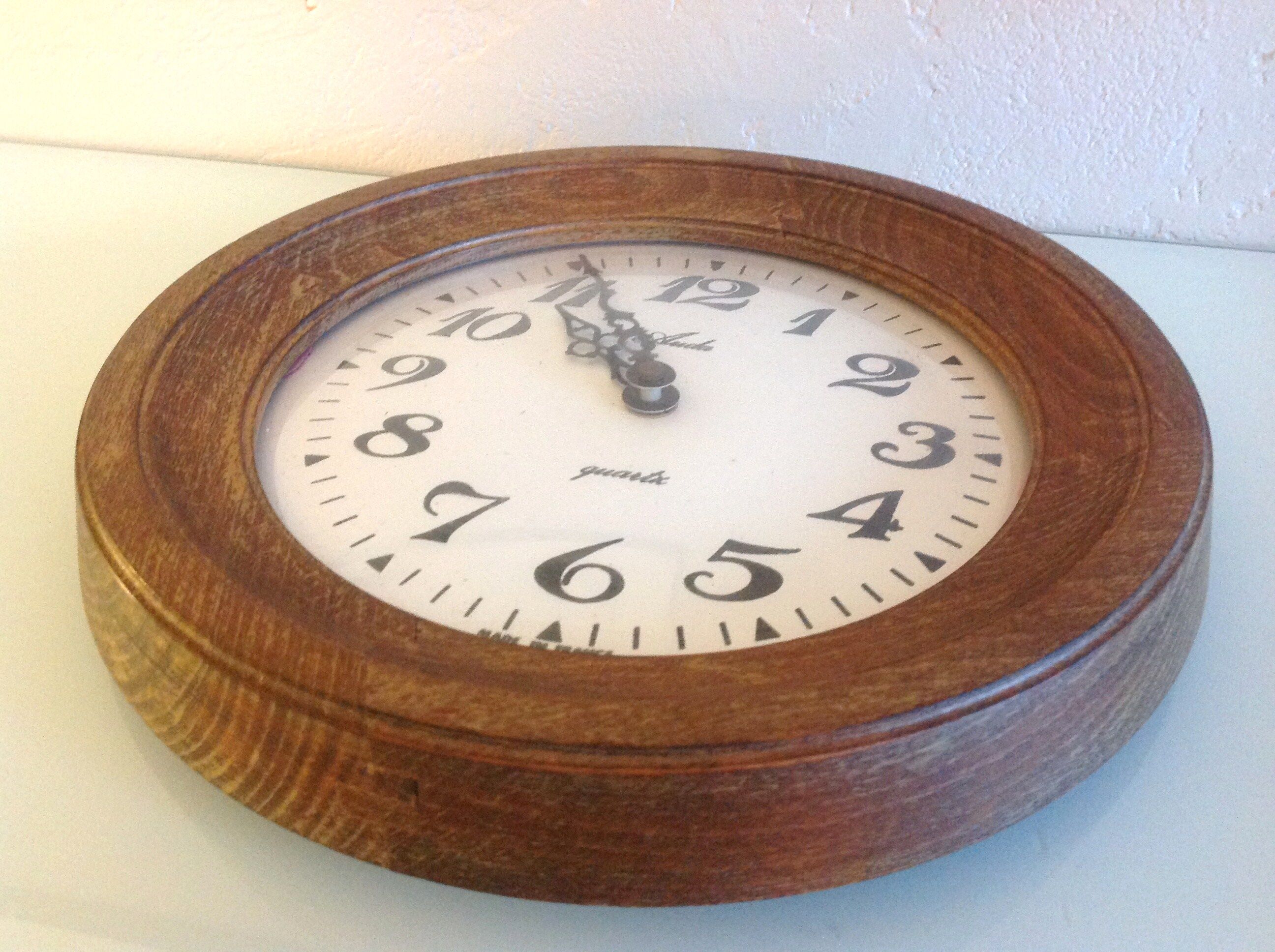Old round wooden clock, vintage 70