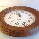 Old round wooden clock, vintage 70