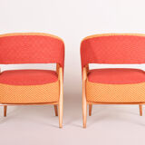 Mid century red and orange chairs. made in 1940
