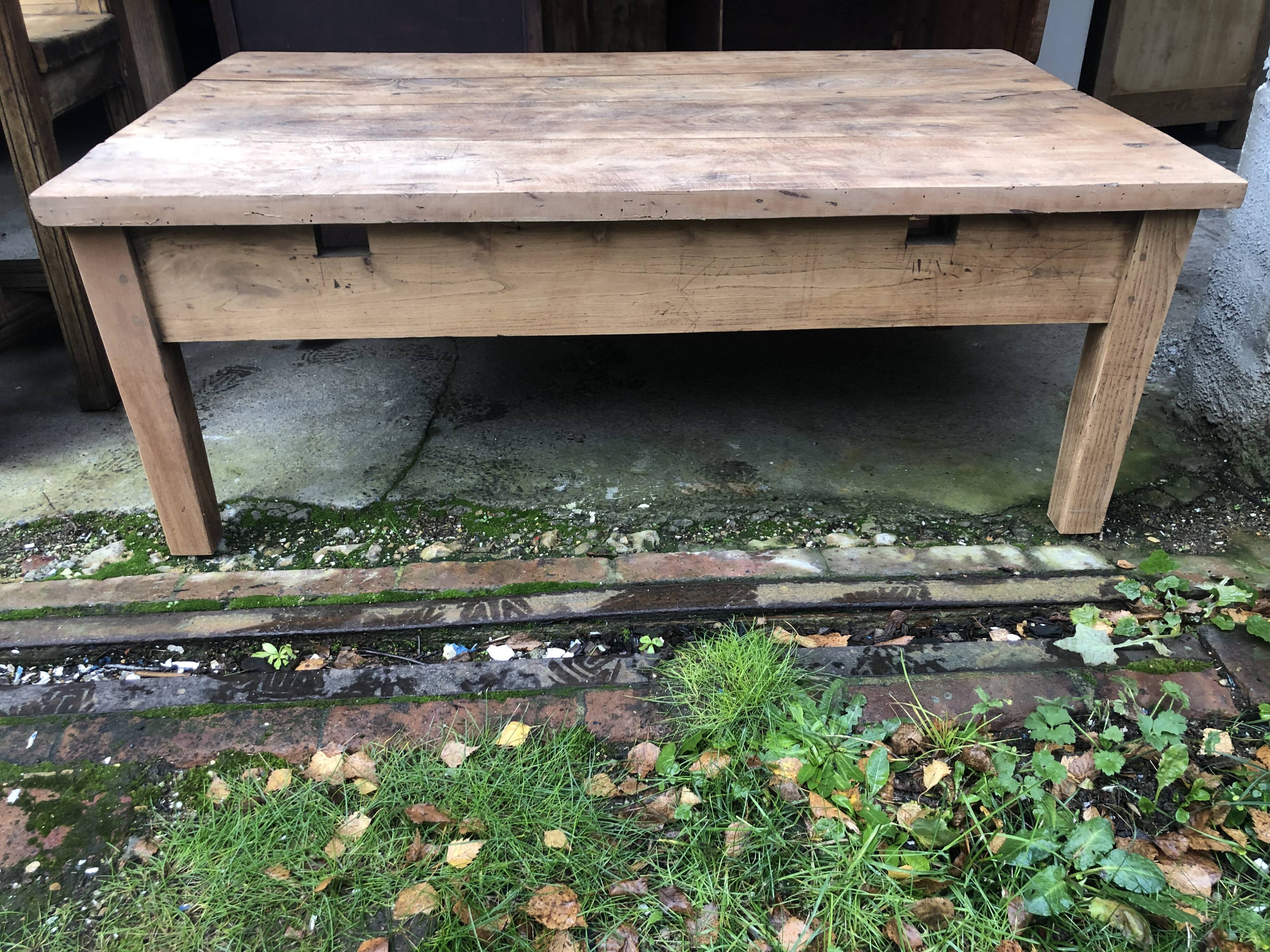 Raw wood farm table coffee table