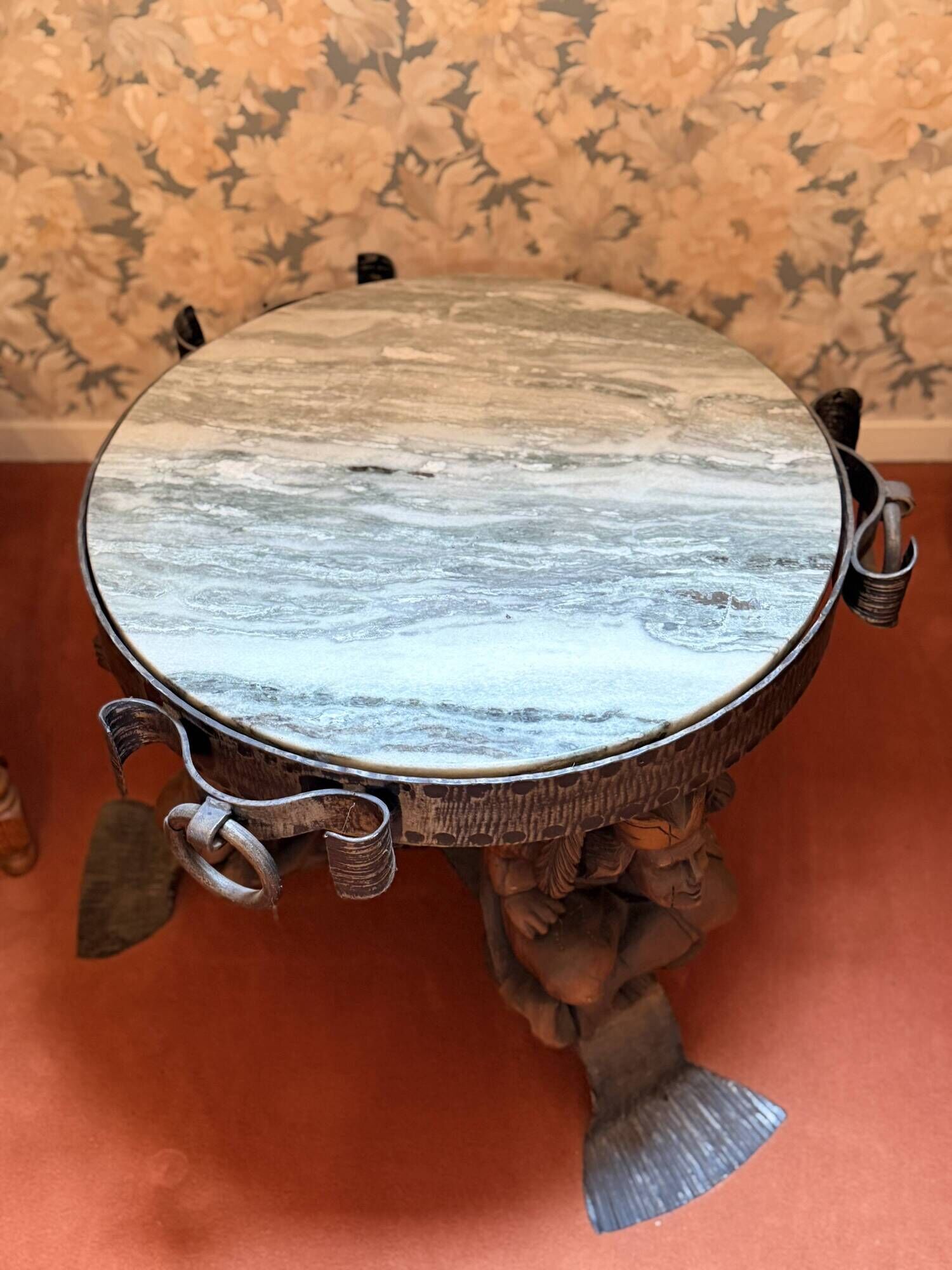 Wrought iron and hammered marble coffee table circa 1950.
