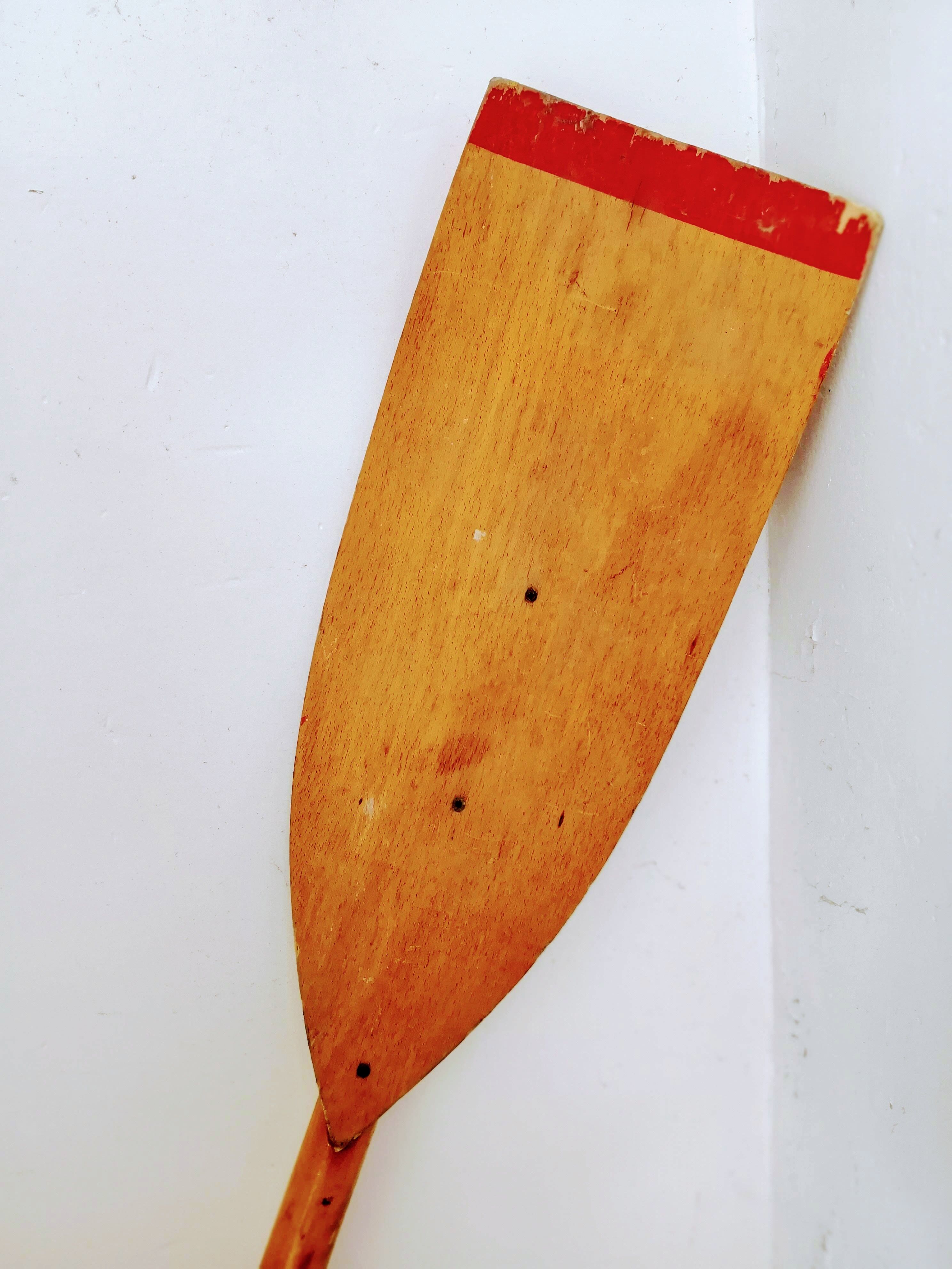 Pair of old wooden oars