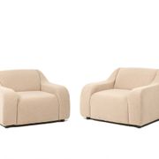 A pair of large and comfortable beige fabric armchairs. Contemporary.