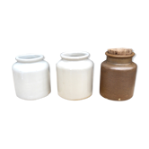 Trio of sandstone mustard pots