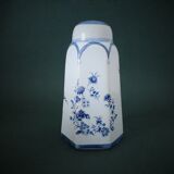 Porcelain salt shaker with blue patterns