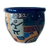 Hide ethnic pot in earth
