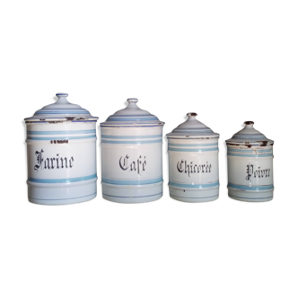 Series of old spice pots in enamelled sheet metal