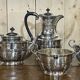 English tea and coffee set in silver metal early twentieth century with sugar bowl and milk pot