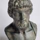 Bust of Esculape in patinated plaster on marble base, 21 cm