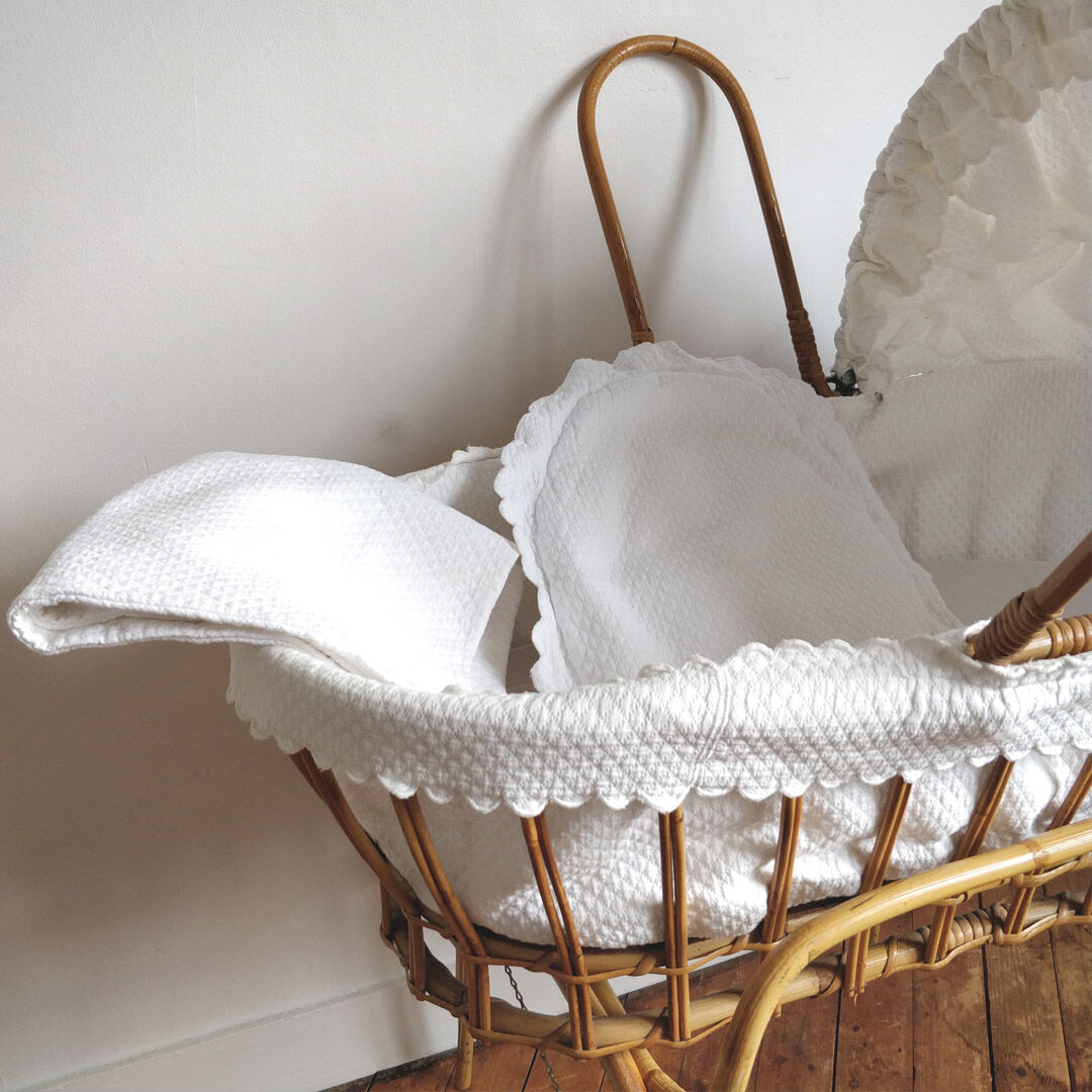 Rattan couffin on stand