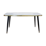Low table with compass feet with decorative cabinet