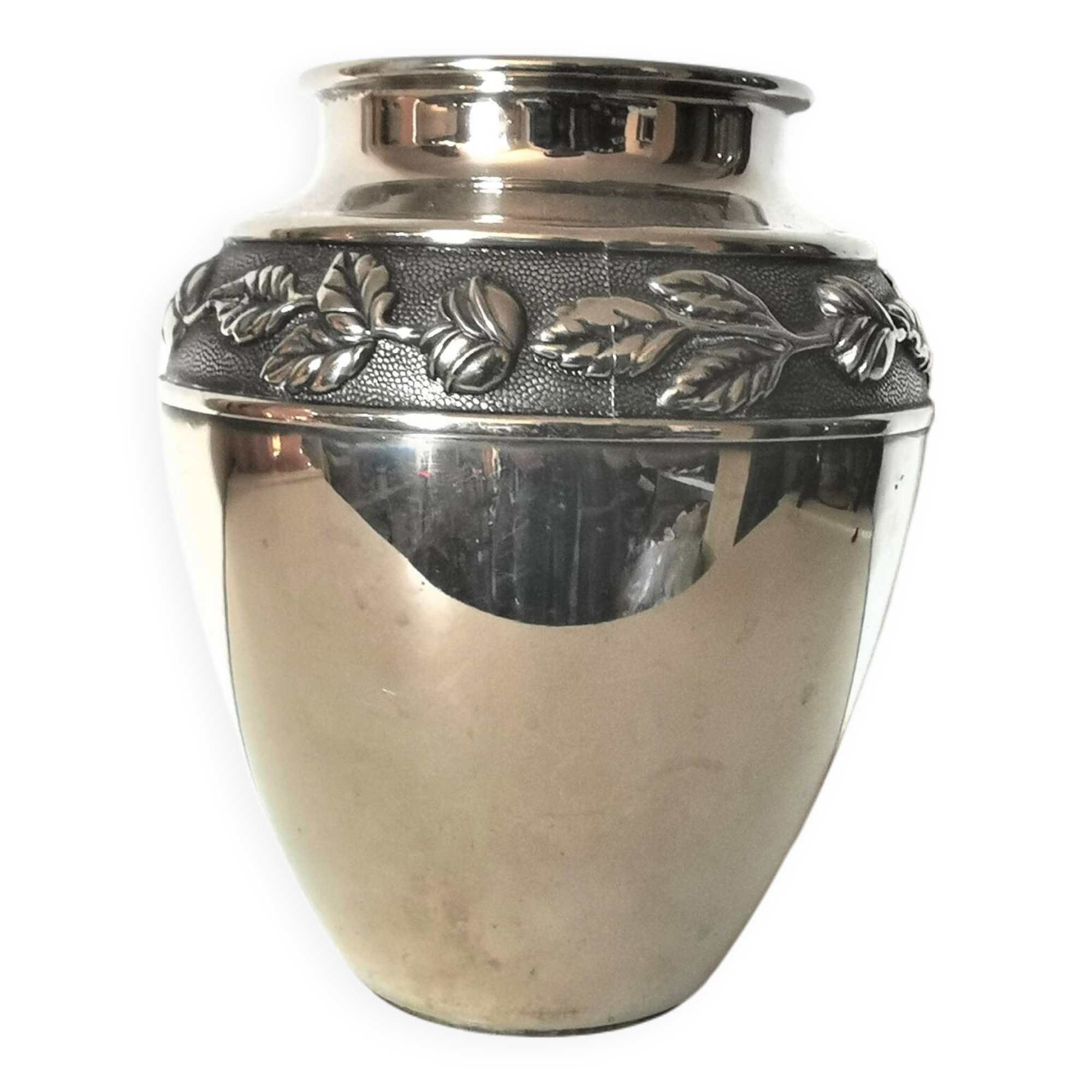 metal vase, flowers in relief