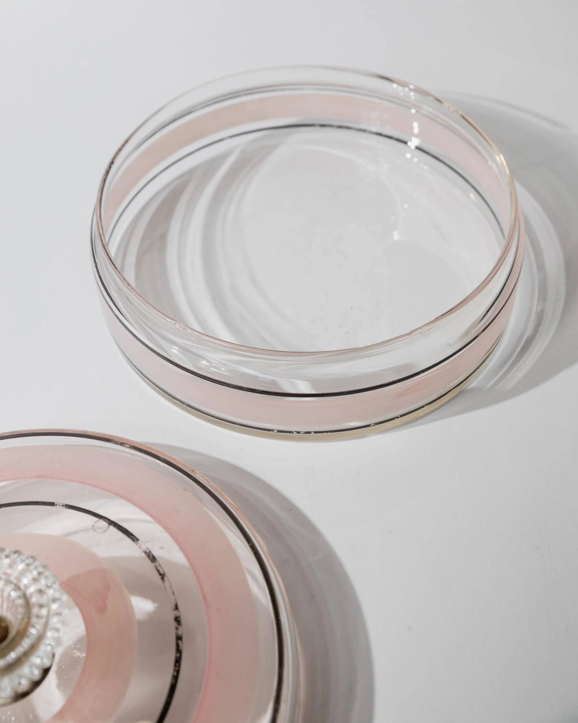 Vintage glass sweet jar from the 1960s, candy jar with a pink and black striped lid, Italian glass art.