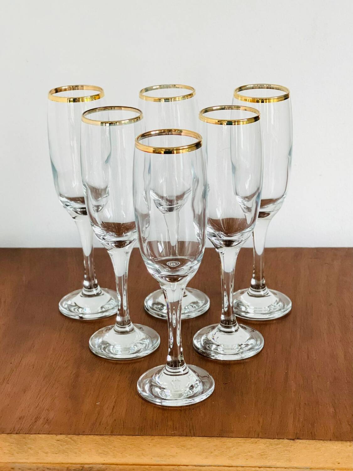 Gold rimmed champagne flutes