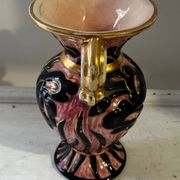 Vintage Vallauris vase amphora with relief floral decoration.