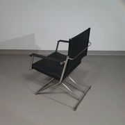 2 chaises pliantes en cuir chromé