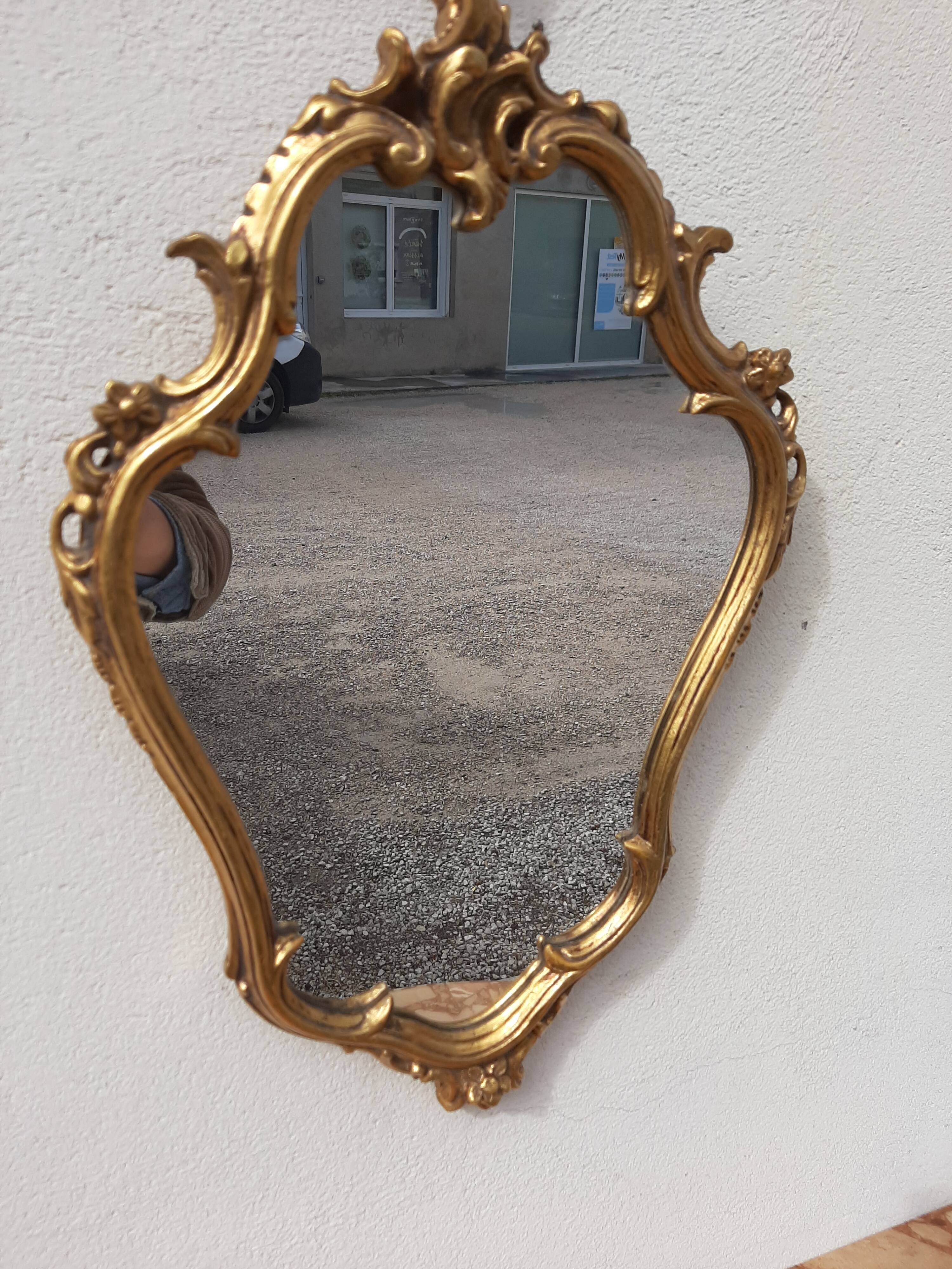 Pair of mirror Baroque style Louis XV gilded