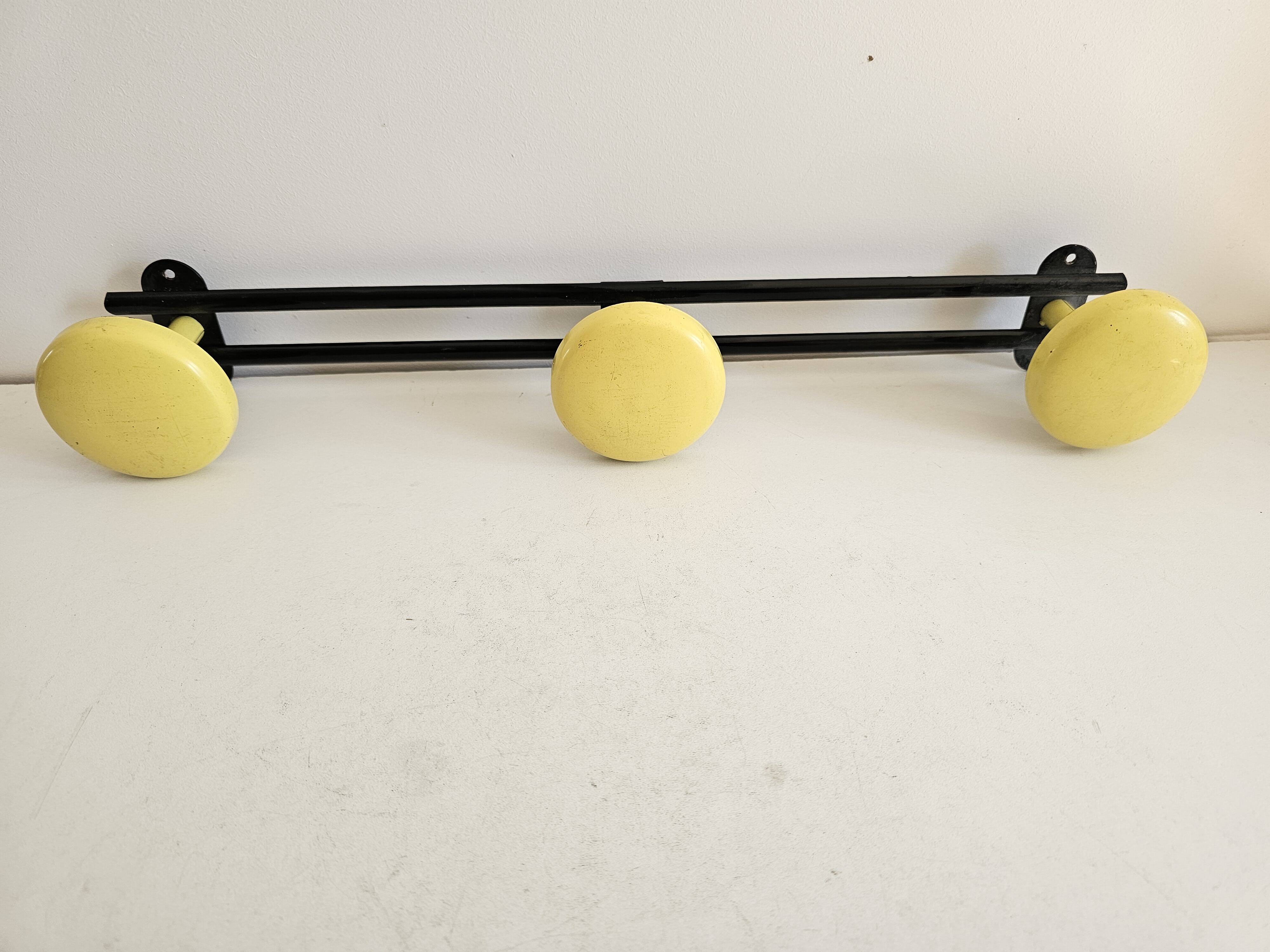 Black and yellow metal wall coat rack (3 hooks)