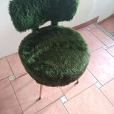 Green plush chair 70s
