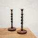 Paire de bougeoirs anciens en bois et bronze