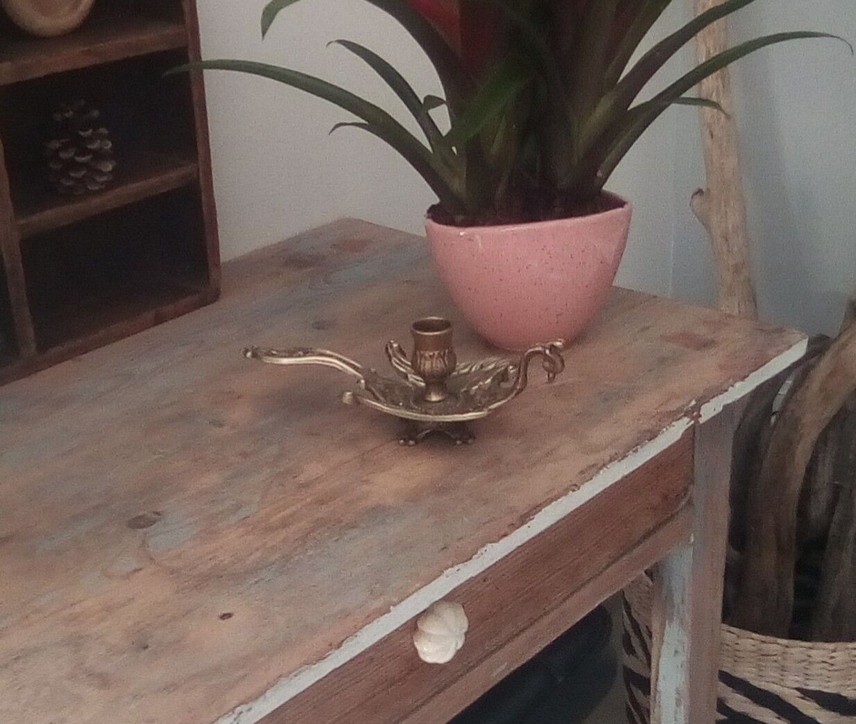 Old hand candlestick in chissed solid brass