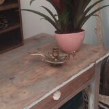 Old hand candlestick in chissed solid brass