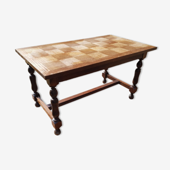 Vintage wooden table with checkerboard pattern