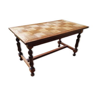 Vintage wooden table with checkerboard pattern