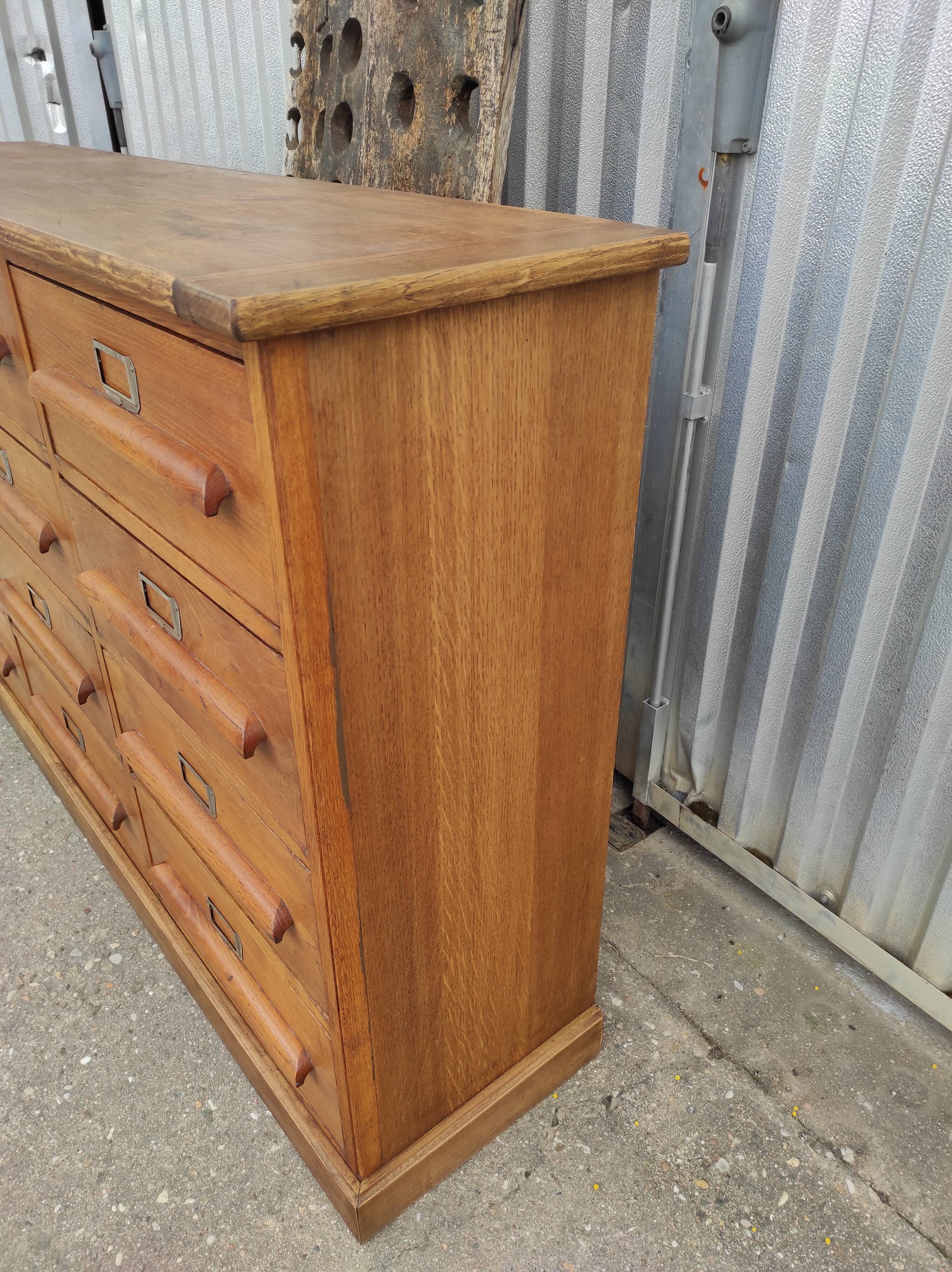 Trade furniture with 12 drawers in gilded oak