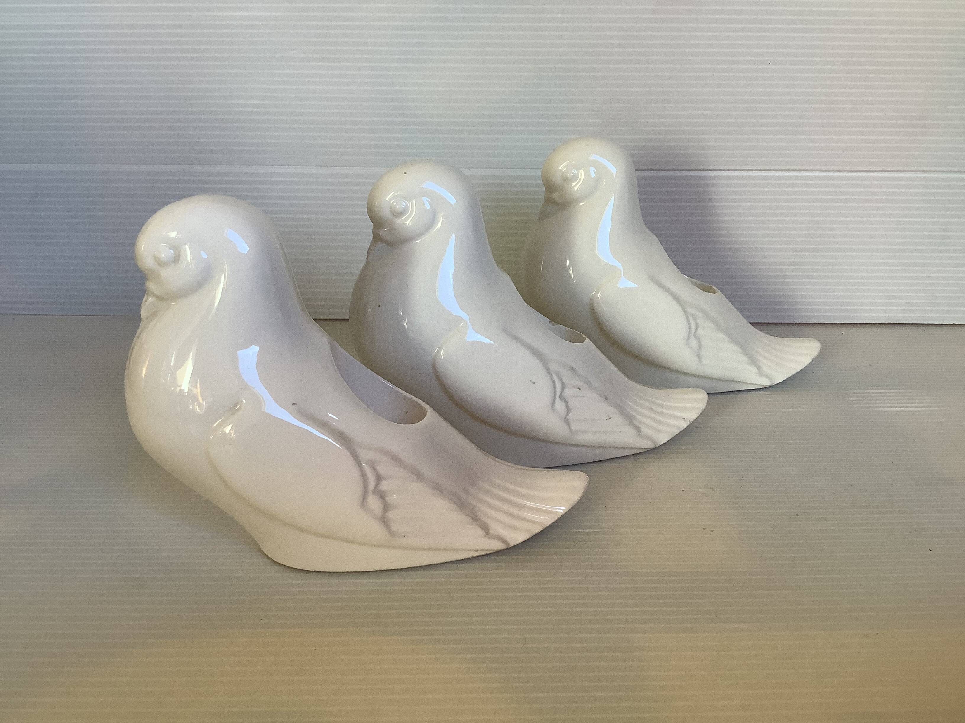 Seven dove bird candle holders