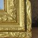 Antique mercury mirror in the Napoleon III style.